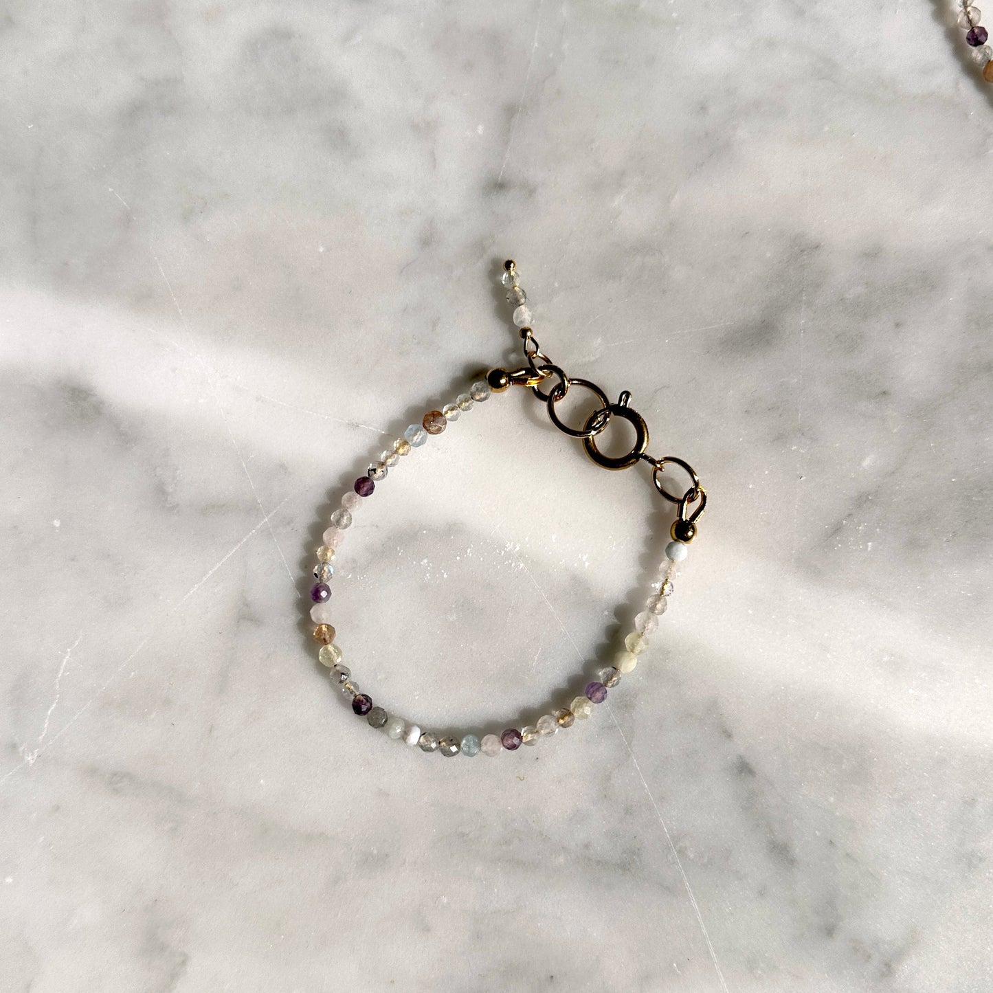 Bracelet with beads on a marble surface