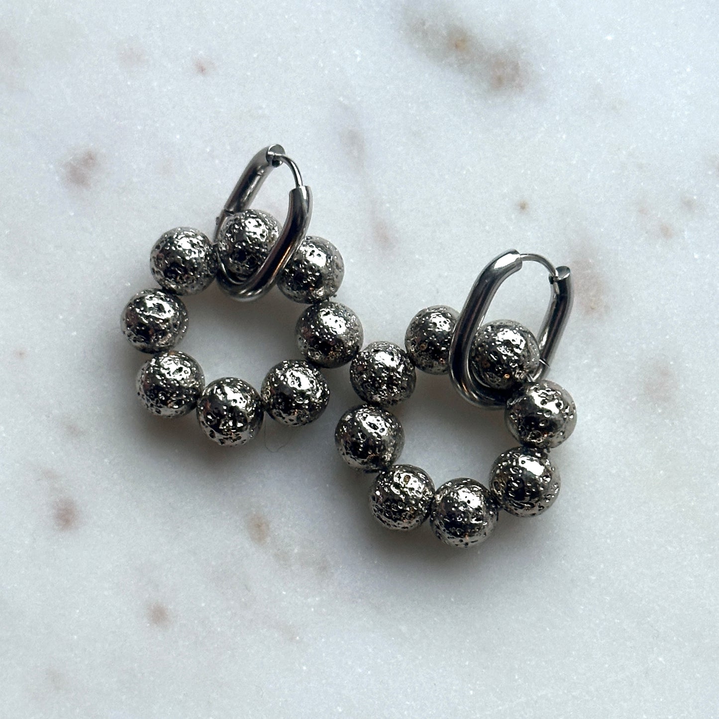 Ioana • lava stone creole earrings