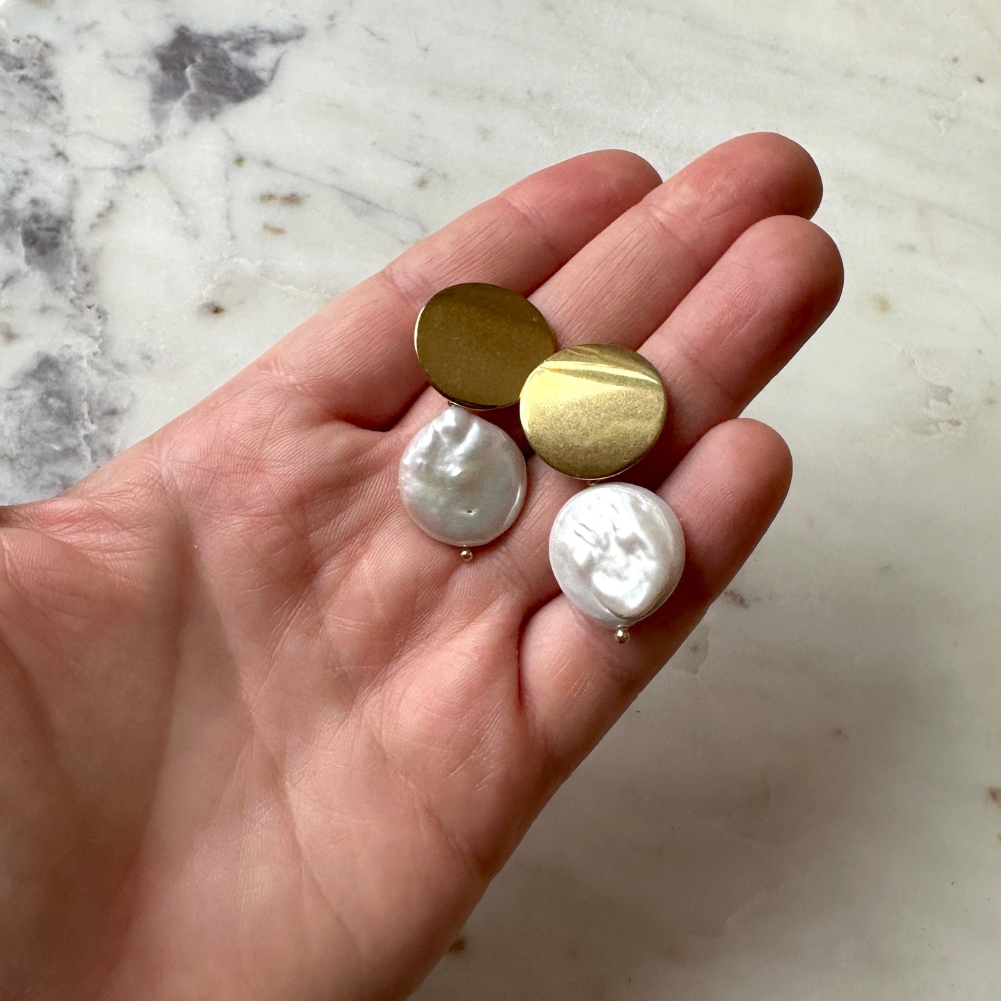 Pearl earrings on a gold stud