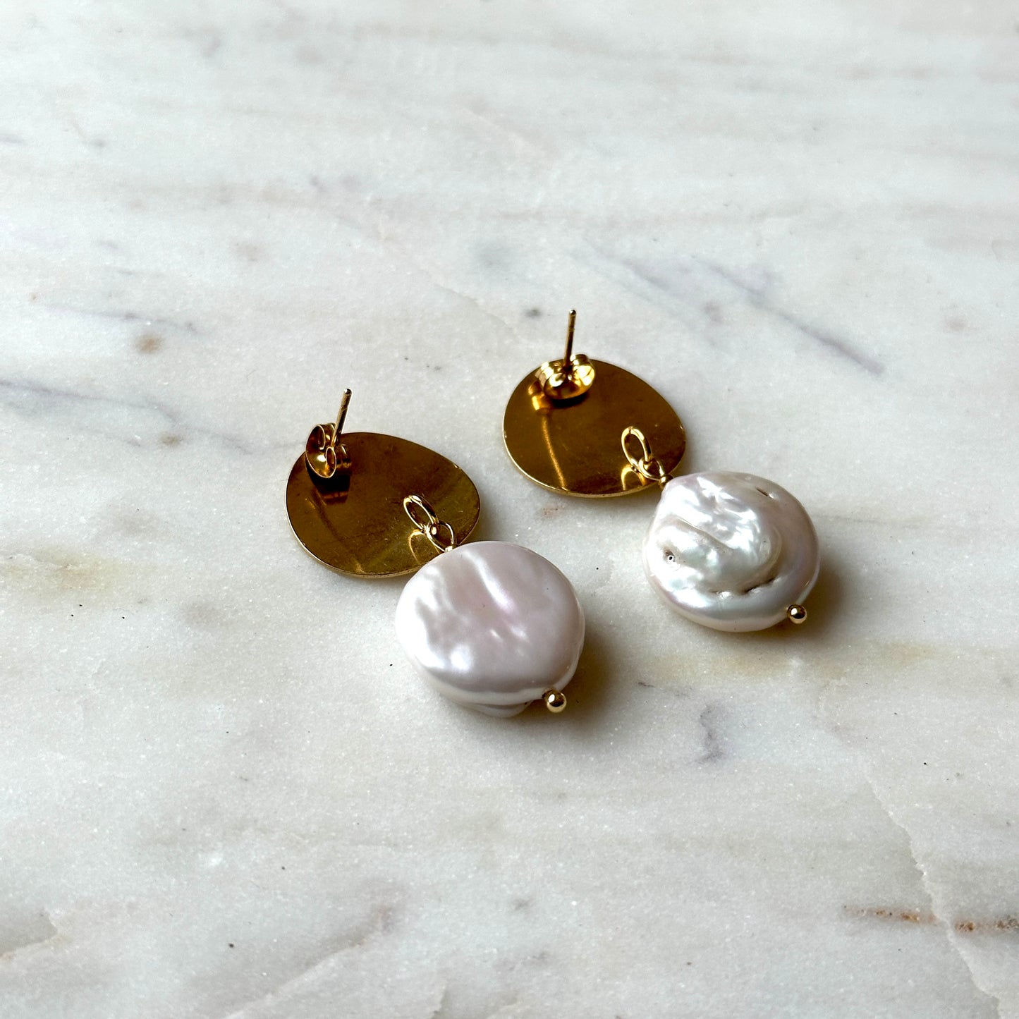 Pearl earrings on a gold stud